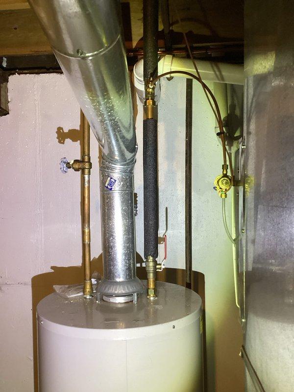 Completed annual heating maintenance on residential furnace system. Inspected water heater installation including vent pipe, supply lines, valves and connections. Provided complimentary filter as per previous agreement with client.