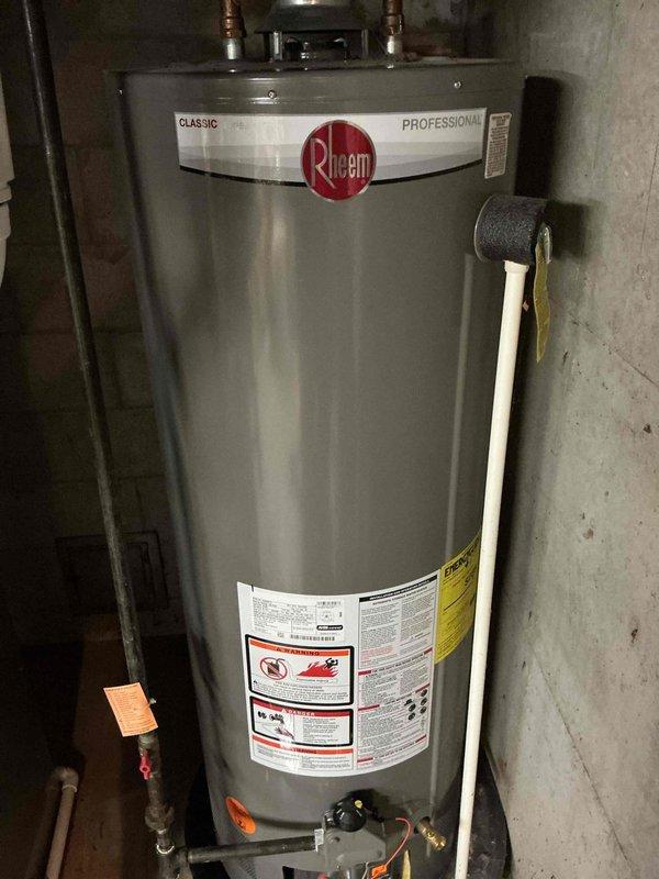 Diagnosed and serviced 5-year-old Rheem Classic Professional water heater that was not heating water to proper temperature. Completed thermal adjustment and operational verification to restore proper water heating functionality.