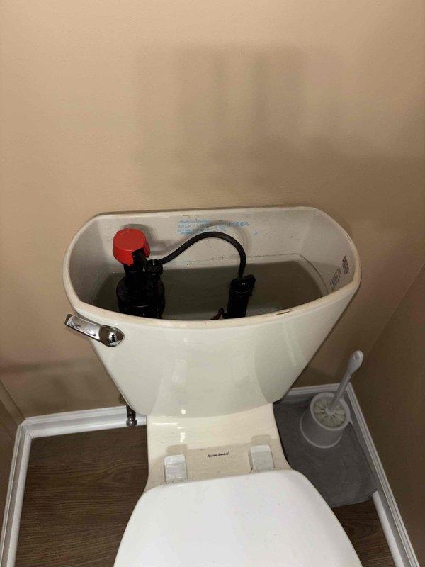 Responded to service call for toilet not flushing properly in main bathroom. Upon inspection, removed tank lid and examined internal components, identifying issue with flush mechanism. Replaced faulty flush valve assembly, adjusted water level, and verified proper operation through multiple test flushes. Toilet now functioning correctly with complete flush cycle.