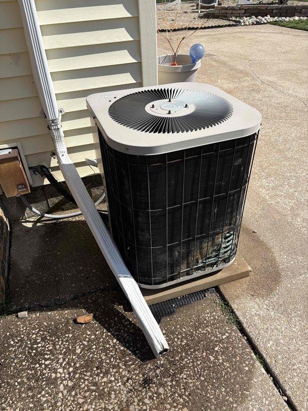 Completed annual heating tune-up on aging furnace system (approx. 15 years old, brand undetermined). Noted absence of humidifier on club membership. Client requested estimate for new AC unit and possible furnace replacement; documented current outdoor condenser condition and water heater setup for quote purposes.