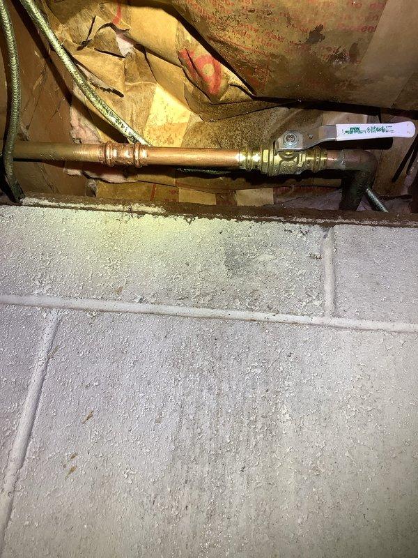 Responded to a plumbing leak call involving an outdoor spigot causing water intrusion into the home. Upon inspection, identified deteriorated insulation around copper supply lines and a compromised valve connection. Replaced the faulty valve assembly, restored proper pipe connections, and ensured complete cessation of the leak with successful pressure testing.
