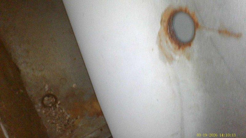 Responded to no heat call where system was blowing cold air. Diagnosed significant water damage and corrosion on heat exchanger with visible rust formation around exhaust openings. Determined unit requires heat exchanger replacement due to compromised integrity and safety concerns.