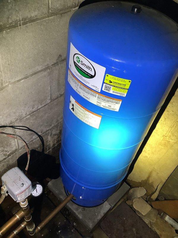 Replaced malfunctioning valve and associated piping on water softener system that was cycling too frequently. Verified proper operation of the Smith pressure tank and copper supply lines after installation. System now functioning within normal parameters.