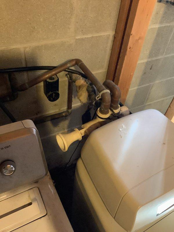 Replaced malfunctioning valve and associated piping on water softener system that was cycling too frequently. Verified proper operation of the Smith pressure tank and copper supply lines after installation. System now functioning within normal parameters.