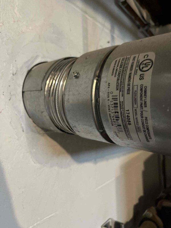 Performed annual heating tune-up on aging system with no humidifier. Inspected and documented condition of electrical connections and water heater installation including vent pipe and valve configuration. System is operational with maintenance contract valid through 2025.