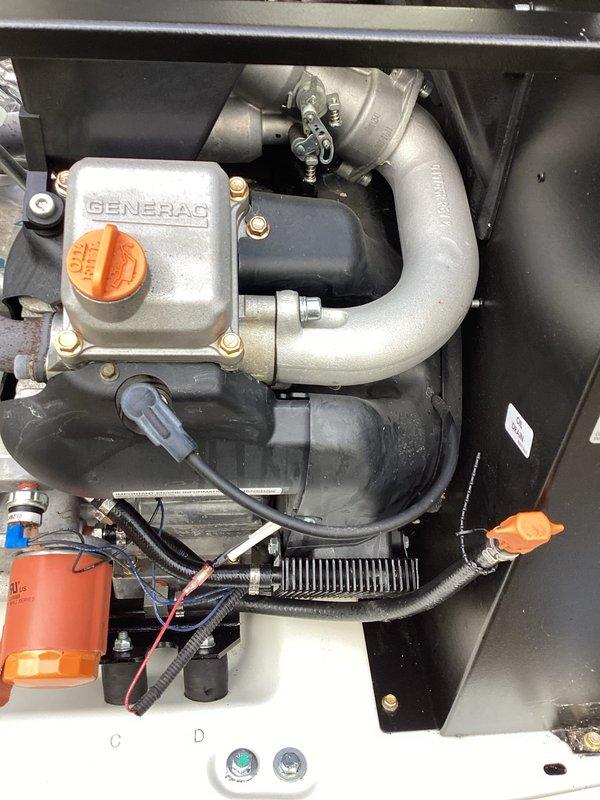 Performed scheduled 3-year generator tune-up service on Generac unit that displayed charging warning. Diagnosed battery charging issue, inspected all engine components and electrical connections. Verified proper operation after service with no warning indicators present.