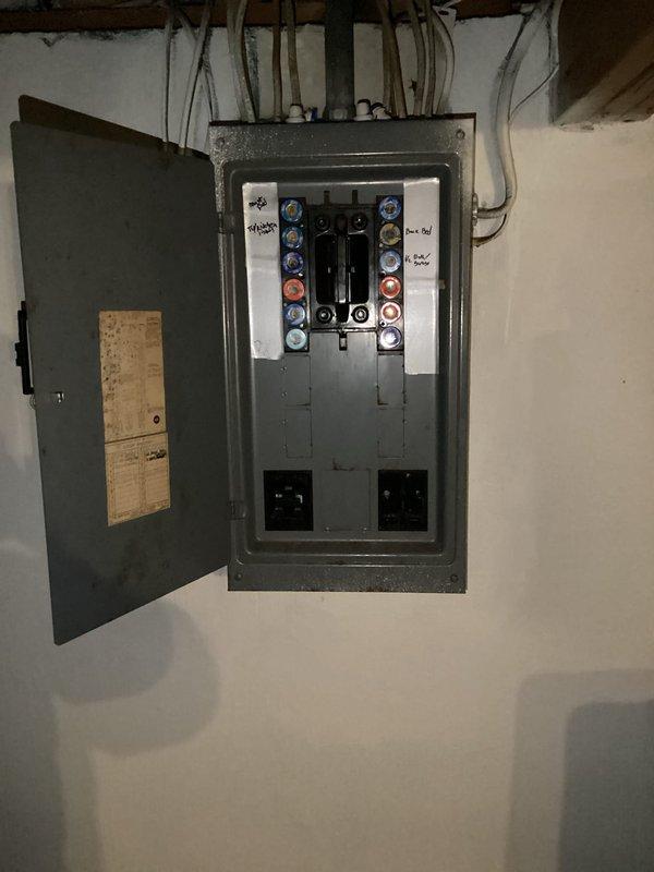 Conducted site assessment for upcoming electrical installation project, documenting existing electrical panel configuration and examining deteriorated exterior conduit requiring replacement. Photographed current conditions to develop appropriate scope of work and procured necessary materials for scheduled Tuesday installation.