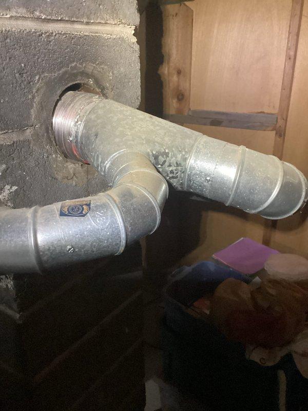 Performed annual heating tune-up on a 21-year-old Amana furnace system. Inspected ductwork connections and ventilation components, confirming proper seals on metal joints. No humidifier present on system; furnace is functioning within normal parameters with maintenance completed according to manufacturer specifications.