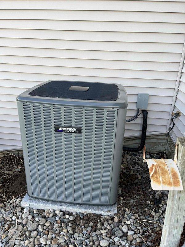 Completed installation of a new Perfect Air furnace and AC system, including proper mounting of the outdoor condensing unit on a concrete pad with electrical disconnect and connection to existing ductwork. Indoor furnace unit was installed in basement with PVC drainage pipes and appropriate venting, with all debris removed and system tested for proper operation after installation.