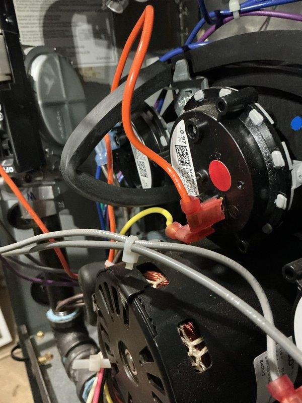 Performed annual heating system maintenance on EnergiAir furnace (model WT 09-2034). Conducted comprehensive tune-up including inspection of motor assembly, electrical connections, and belt condition. All components functioning properly with no humidity issues noted.