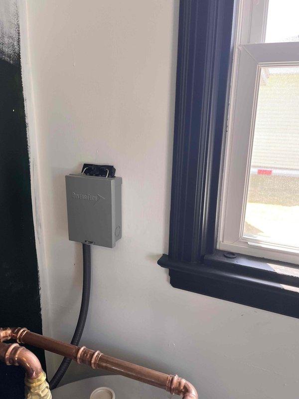 Successfully installed new electric water heater according to quote specifications. Completed tie-in of new 2" standpipe and installed waterline loop for water softener system. All copper and PVC piping properly secured to wall with appropriate fasteners, and electrical connections properly housed in junction box.