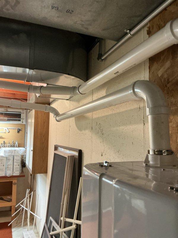 Successfully installed a tankless water heater in the basement utility area as quoted. Connected the unit to existing plumbing infrastructure, ensuring proper integration with the home's water treatment system that includes a water softener and filtration tank. Completed installation in one day with photo documentation of the finished work.