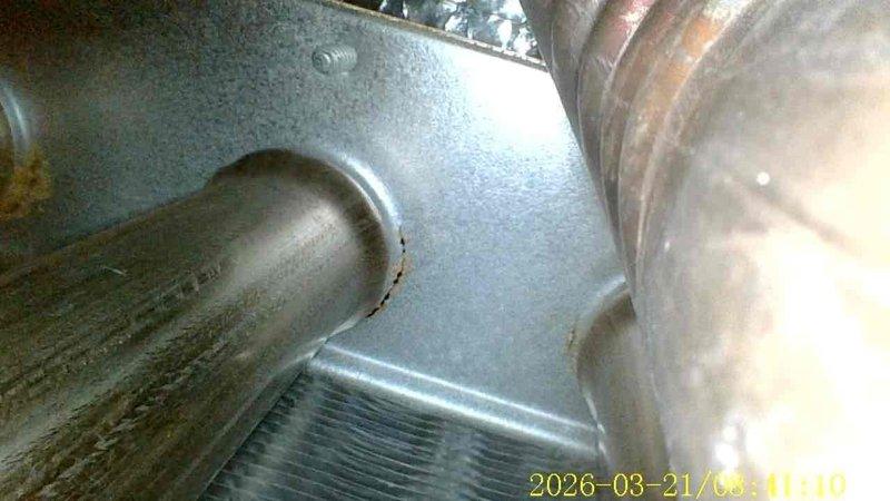 Completed Annual Heating Service on 15-year-old Amana furnace and humidifier. Inspection revealed corrosion at connection points and heat exchanger fins, which were cleaned and treated. System is functioning within normal parameters after tune-up.