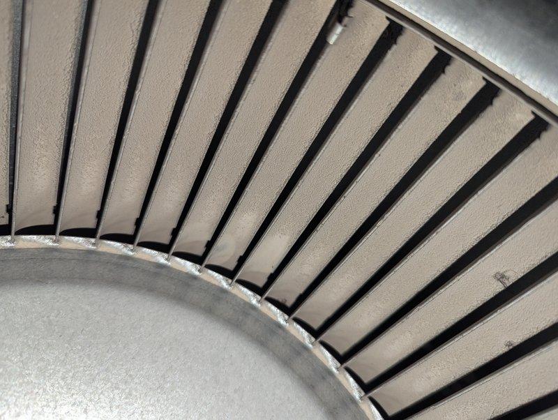 Responded to no-heat complaint on 13-year-old American Standard furnace. Diagnostic inspection revealed significant damage to heat exchanger with visible metal tearing and structural compromise. System requires replacement due to cracked heat exchanger posing safety concerns.