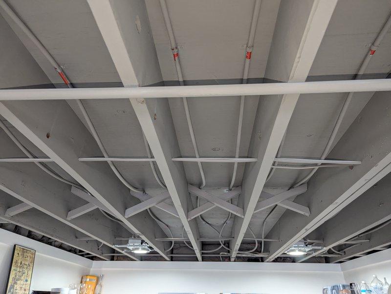 Responded to service call for non-functioning 2-year-old Navien boiler with no hot water production. Inspected ceiling infrastructure and piping to identify issue. Resolved problem and restored proper hot water function; system now operating within normal parameters.