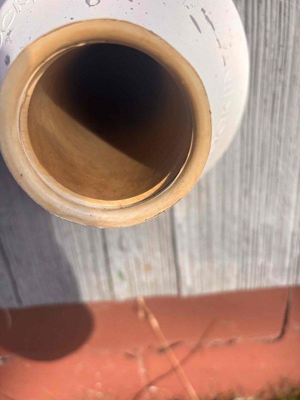 Responded to no heat complaint for 12-year-old furnace that attempts to run, then shuts off and blows cold air. Used borescope to inspect duct system and venting. Identified obstructed clay flue pipe with visible moisture, indicating potential exhaust venting issues causing safety shutdown of furnace.