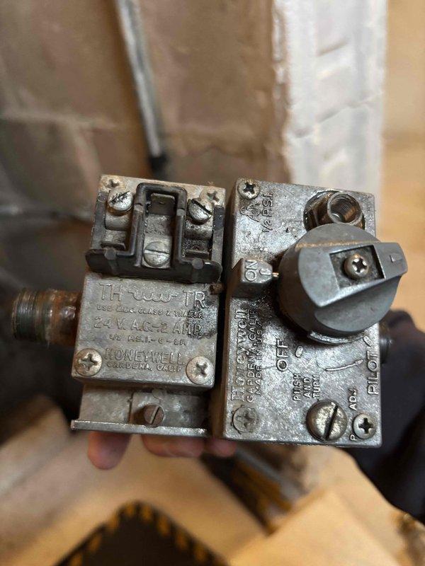 # Service Summary

Responded to no-heat call for member returning from vacation who found pilot light extinguished and unable to remain lit. Upon arrival, performed complete diagnostic evaluation of heating system. Measured flue gas temperature at 62°F, confirming lack of combustion. Inspected gas valve assembly and thermocouple circuit. Found failed thermocouple unable to generate sufficient millivoltage to hold gas valve open, preventing pilot from staying lit. Removed and replaced defective thermocouple with new component. Verified proper thermocouple positioning in pilot flame and tightened all connections. Re-lit pilot light and confirmed stable flame with adequate flame signal. Tested main burner ignition sequence and verified normal operation. Checked gas valve operation including Honeywell 24VAC controls. Confirmed proper system function through complete heating cycle. System restored to full operation with reliable pilot flame and main burner ignition.