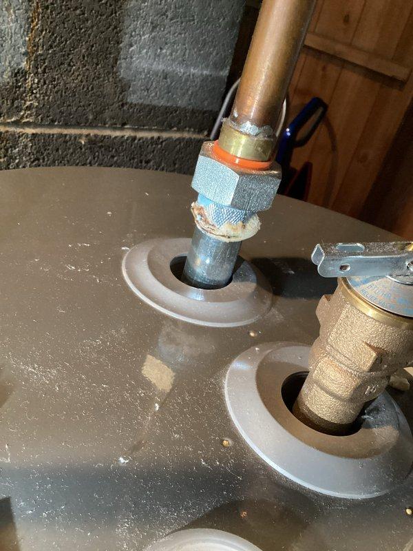 # Annual Heating Service Visit Summary

Completed scheduled annual heating system maintenance and furnace tune-up service. Performed comprehensive inspection of HVAC system components including ductwork examination and heating equipment evaluation. Documented system conditions through photographic records showing interior ductwork with normal dust accumulation on reflective insulation surfaces and heating appliance plumbing connections with brass fittings and shut-off valves in serviceable condition. System operational with no humidifier service required per customer specifications.