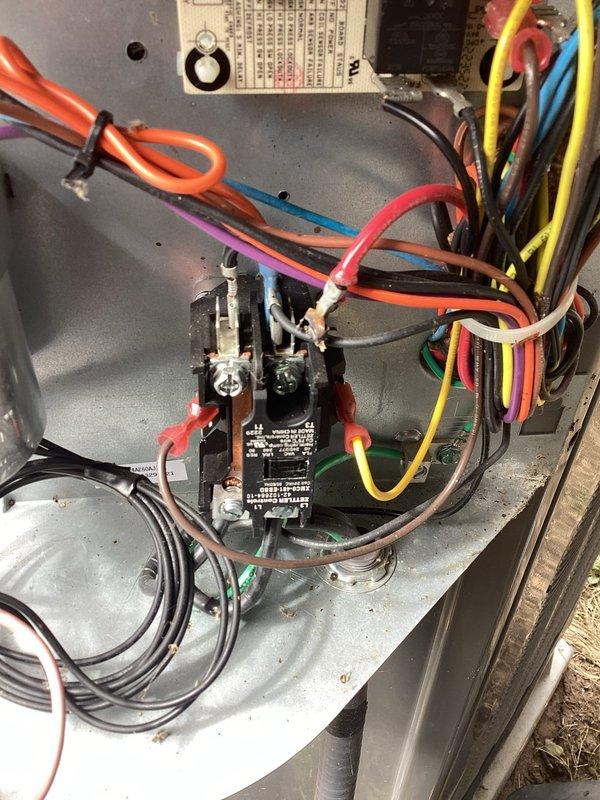 # Service Report: Heat Pump No Heating

Responded to service call for 2-year-old heat pump system reported as not working in heating mode. Upon arrival, performed comprehensive system diagnostics on outdoor condensing unit. Inspection revealed failed contactor preventing compressor and condenser fan operation. Contactor contacts showed signs of pitting and electrical arcing, indicating end of component life. Verified proper voltage supply at disconnect and control circuit functionality. 

Replaced defective contactor with OEM-spec replacement rated for system amperage requirements. Reconnected all electrical connections to manufacturer specifications, ensuring proper wire routing and secure terminations. Tested capacitor under load conditions—readings within acceptable range. Cycled system through complete heating operation, confirming compressor startup, proper amperage draw, and condenser fan rotation. Verified thermostat communication and heat pump reversing valve operation. System 