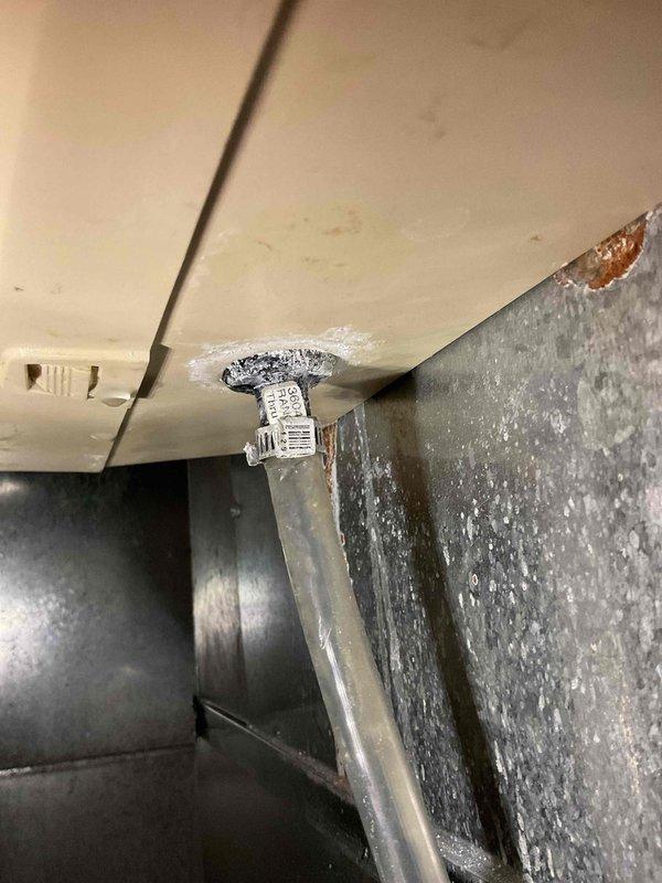 # Annual Heating Visit Summary

Completed comprehensive annual heating maintenance on 4-year-old Carrier furnace model WT 11-2031 with integrated humidification system. Performed standard tune-up procedures including visual inspection of all accessible components, burner assembly evaluation, and heat exchanger examination. Inspected humidifier operation and mounting hardware, verifying proper integration with HVAC system. Evaluated ductwork connections and cabinet integrity, noting normal wear consistent with system age. Documented equipment condition through photographic records showing humidifier valve assembly, control components, and cabinet interior. All system components found operational with no immediate service needs identified. Equipment remains under coverage through 2025. Customer contact information verified and updated in service records.