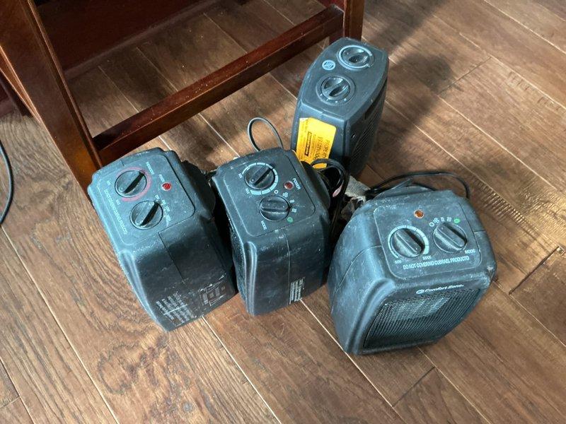 # Service Report: No Heat Call

Responded to no heat service call for 12-year-old carrier furnace reported to be blowing cold air. Upon arrival, found customer utilizing multiple portable electric space heaters throughout residence due to lack of central heating. Conducted diagnostic inspection of heating system including visual examination of furnace components and ductwork. Observed evidence of potential condensate or moisture issues on supply ductwork as indicated by rust-colored staining on insulated piping. System age and condition suggest underlying mechanical or ignition failure preventing proper heat delivery. Documented equipment condition and temporary heating measures in place with photographic evidence for service records.