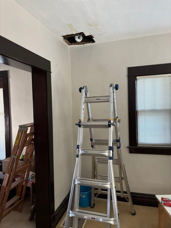 # Plumbing Project Install - Tub/Shower with Surround

Completed full installation of tub/shower combination unit with integrated wall surround system. Removed existing bathing fixtures and prepared rough-in plumbing connections for new installation. Set and leveled acrylic bathtub unit, ensuring proper drain alignment and secure anchoring to wall studs.

Installed three-piece shower surround wall panels with integrated corner shelving units, sealing all seams and joints with waterproof adhesive and caulking to prevent moisture intrusion. Mounted chrome shower valve trim kit and coordinating showerhead assembly to wall panels per manufacturer specifications. Connected supply lines to mixing valve and verified proper hot/cold water operation and temperature control.

Performed final pressure testing of all connections to confirm leak-free installation. Completed finish caulking around tub perimeter and wall panel seams. Cleaned work area and removed all debris and packaging materials. S