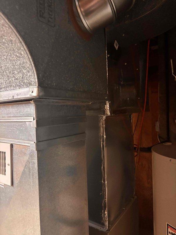Completed annual heating maintenance on 8-year-old Payne furnace system. Performed comprehensive tune-up including inspection of all major components, burner assembly cleaning, filter evaluation, and safety control verification. Unit operational with no humidifier present. Documentation photos captured showing equipment condition and installation environment.