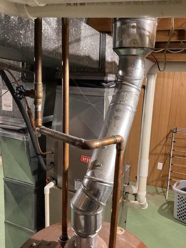 Responded to no hot water call on 25-year-old residential water heater with pilot light that would not remain lit. Upon inspection, determined that the thermocouple had failed due to age and wear, preventing the gas valve from staying open. Replaced the faulty thermocouple, tested pilot assembly operation, and verified proper ignition and flame retention. Restored hot water service to the residence.