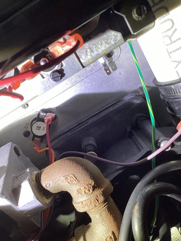 Responded to heating system failure on 12-year-old Luxaire furnace with intermittent ignition and inadequate temperature maintenance. Upon inspection, discovered significant condensation accumulation on pressure switch tubing, indicating drainage obstruction affecting proper system operation. Performed diagnostic testing of electrical components and flame sensor circuit to identify ignition inconsistencies. Cleared condensate drain line blockage, cleaned flame sensor, and verified proper pressure switch operation. System tested successfully with consistent ignition sequence and proper heating cycle restored to maintain desired temperature setpoint.