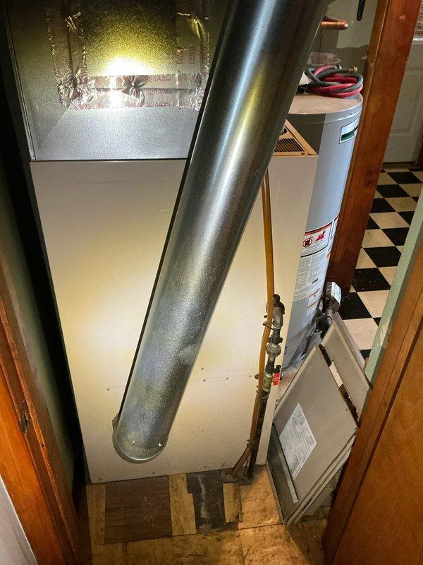 Conducted initial diagnostic assessment on non-operational furnace system in basement mechanical room. System evaluation was incomplete at time of service call, requiring technician to schedule return visit to continue comprehensive diagnosis and determine root cause of heating failure. Documentation photos captured of existing HVAC equipment configuration including furnace unit, Aprilaire humidifier, air handler, ductwork connections, and associated mechanical components for reference during follow-up service appointment.