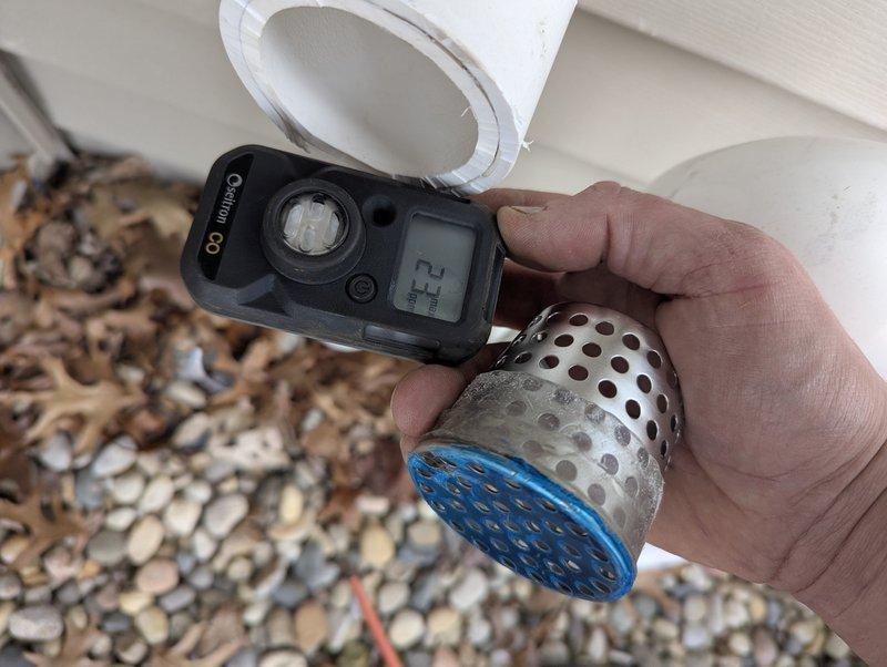 Responded to no heat call with customer reporting furnace not blowing hot air and home temperature unable to rise above 57°F. Upon arrival, performed system diagnostics on 5-year-old Payne furnace installed in 2022. 

Inspected condensate drainage system and identified clogged strainer/filter assembly restricting proper drainage flow. Removed and cleaned perforated metal strainer component with blue mesh filter element from PVC condensate line. Verified condensate switch operation and confirmed proper drainage function after clearing obstruction. 

Tested system operation with digital meter, confirmed furnace firing properly and delivering heated air at appropriate temperature. Verified home heating system restored to normal operation with adequate heat output. System left in proper working condition.