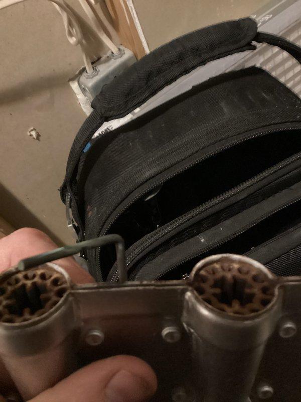 Responded to heating system complaint of clicking noise on 2015 Payne furnace unit. Upon inspection, confirmed system was operating and providing heat normally with burner assembly firing properly. Diagnosed clicking noise originating from zone damper actuator requiring replacement. Verified all other mechanical and electrical components functioning within normal parameters. Documented equipment condition with photos and advised customer of findings. System remains operational pending actuator replacement.