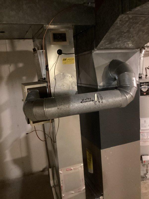 Completed annual heating maintenance on 13-year-old EcoAir furnace system with humidifier. Performed comprehensive tune-up including inspection of furnace components, ductwork, electrical connections, and humidifier operation. All systems tested and operating within normal parameters; documentation photos taken of equipment installation and utility infrastructure.