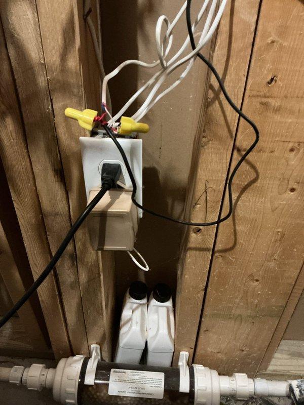 Responded to service call for 4-year-old Navien tankless water heater displaying error message. Upon arrival, performed diagnostic inspection of unit and reviewed error code on digital display panel. Inspected all electrical connections at junction box, verified proper wiring and secure wire nut connections. Examined water supply lines, gas connections, and PVC venting system for proper installation and function. Cleared error code, tested unit operation, and confirmed system returned to normal heating cycle with no fault codes present.