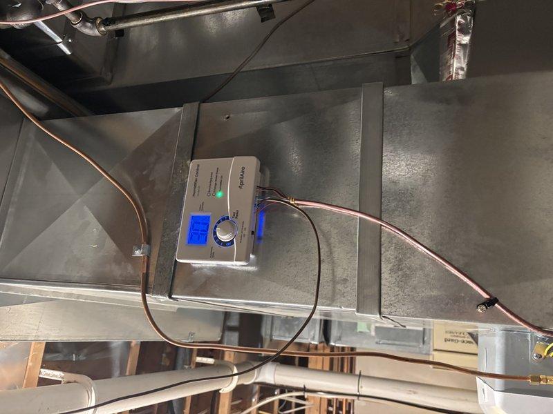 Completed installation of bypass humidifier with automatic control on existing HVAC ductwork system. Mounted humidifier unit to supply plenum, connected water supply line with copper tubing and saddle valve, installed humidistat control with digital display for automated humidity management, and verified proper operation of all components. All work completed per manufacturer specifications and includes 3-year guarantee on parts and labor.
