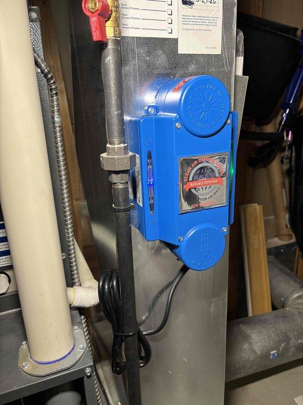 Completed installation of UV light system on HVAC unit. Mounted blue UV light device to equipment panel with proper electrical connections and secured all associated conduit and wiring. System tested and confirmed operational upon completion.
