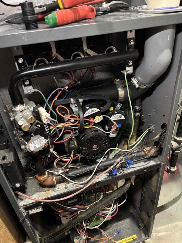 Completed installation of UV light system on HVAC unit. Mounted blue UV light device to equipment panel with proper electrical connections and secured all associated conduit and wiring. System tested and confirmed operational upon completion.