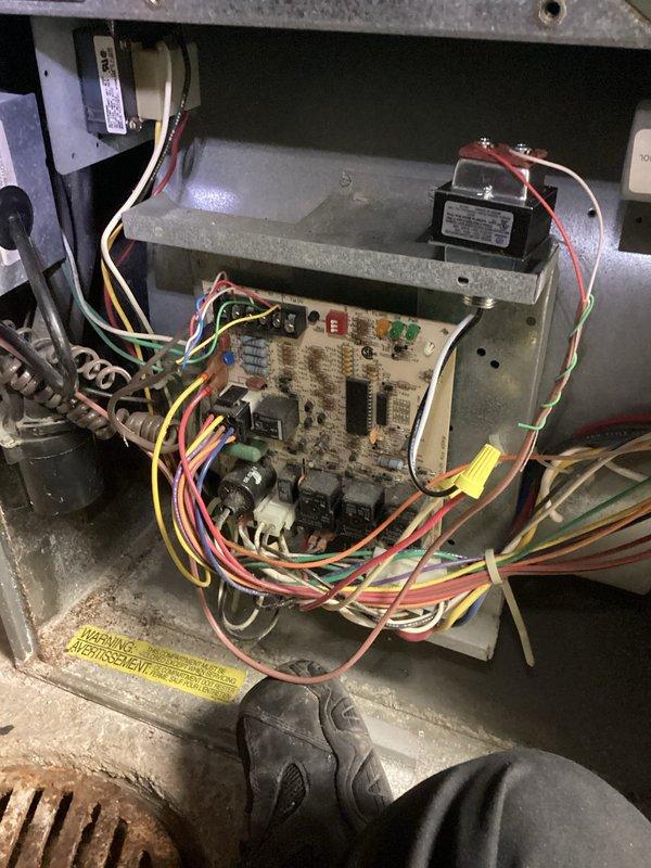 Completed installation of AprilAire whole-home humidifier system with automatic control integration into existing HVAC ductwork. Mounted humidifier control unit on supply plenum, connected water supply line, established electrical connections to furnace control board, and verified proper communication between humidifier controller and HVAC system for automated humidity management.