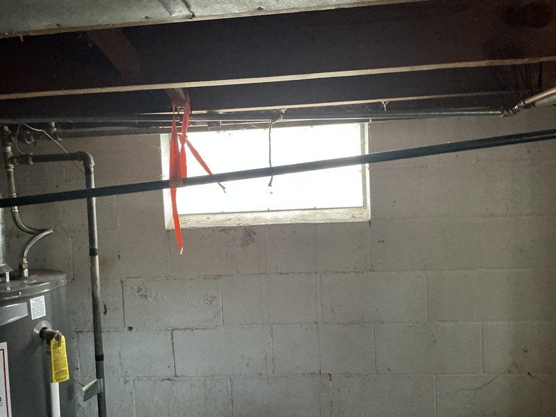 Completed comprehensive water heater replacement estimate for residential property. Assessed existing water heater installation in unfinished basement, documenting current configuration including galvanized steel piping, flexible braided stainless steel connectors, aluminum vent pipe system, and standard plumbing connections. Photographed equipment layout and utility room conditions to provide accurate replacement specifications and pricing options.