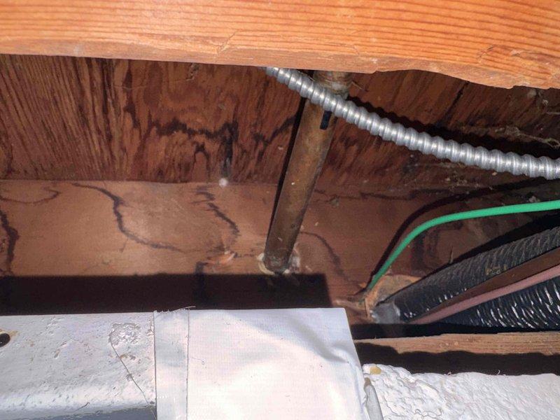 Replaced defective outdoor spigot that had been dripping for several months. Accessed supply line through crawl space, shut off water supply, removed old frost-free sillcock, and installed new frost-proof exterior faucet with proper pitch for drainage. Tested for leaks and verified proper operation.