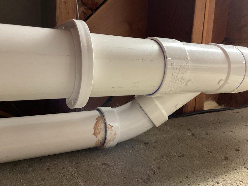 Completed annual heating maintenance on furnace system without humidifier. Inspected exhaust pipe area in response to customer concern about residue buildup near connection points; confirmed minor discoloration on PVC condensate drain piping is normal accumulation and does not indicate a safety concern or system malfunction. All heating system components operating within normal parameters.