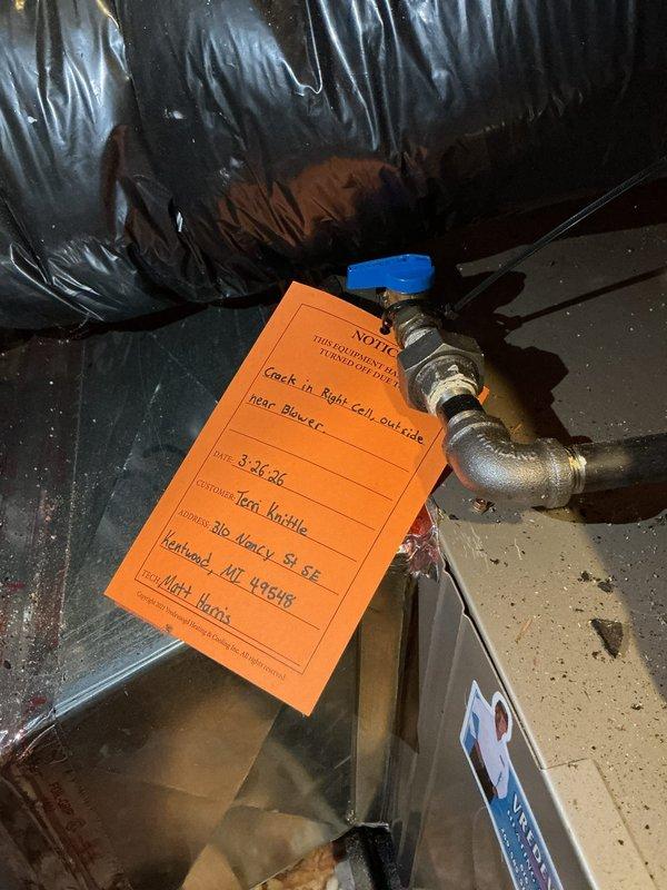 Completed annual heating maintenance on Carrier furnace system located in attic. Performed comprehensive tune-up including inspection of all components, burner assembly, heat exchanger, blower motor, and gas connections. During inspection, identified a crack in the right coil near the blower assembly and tagged the equipment with a notice. Documented findings with inspection camera imagery showing the compromised coil. System was evaluated for proper operation prior to discovery of the crack. All safety checks and standard maintenance procedures were completed per manufacturer specifications.