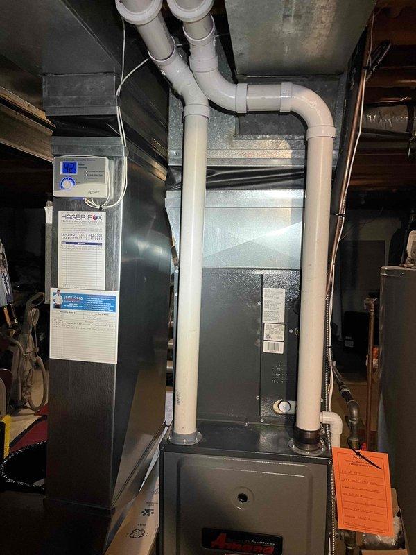Completed comprehensive furnace super tune-up on 15-year-old Amana heating system. Performed full system inspection including burner assembly cleaning, flame sensor maintenance, blower motor lubrication, and air filter evaluation. Verified proper operation of intake and exhaust PVC venting system, tested all safety controls, and confirmed adequate airflow through ductwork. System operating within manufacturer specifications with no issues identified.