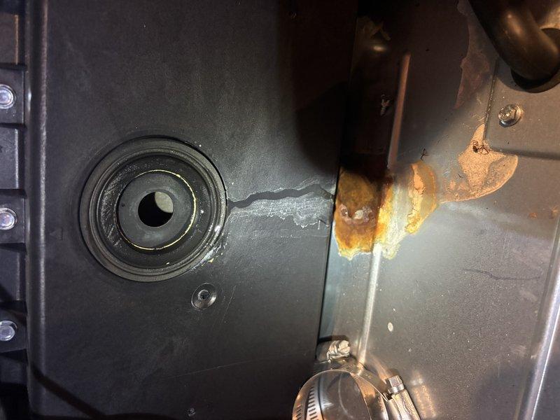 Completed annual heating maintenance on 6-year-old EnergiAir furnace with warranty valid through December 2029. Performed comprehensive tune-up including inspection of all major components, burner assembly, heat exchanger, blower motor, and electrical connections. Documented significant rust and corrosion present on cylindrical blower motor housing and adjacent pipe connections, indicating moisture exposure over time. Noted oxidation affecting metal surfaces at junction points with brownish-orange discoloration and surface degradation. Verified system operational functionality and captured photographic documentation of equipment condition for service records. No humidifier present on system.