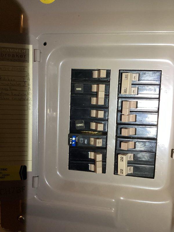 Conducted comprehensive estimate for HVAC system installation in crawl space, including air conditioning unit and furnace equipment. Assessed existing electrical infrastructure by inspecting main breaker panel to verify adequate circuit capacity and proper breaker configuration for new HVAC equipment requirements. Documented current electrical setup showing dedicated circuits for range and furnace, photographed panel layout and breaker arrangement to determine compatibility with proposed system specifications.