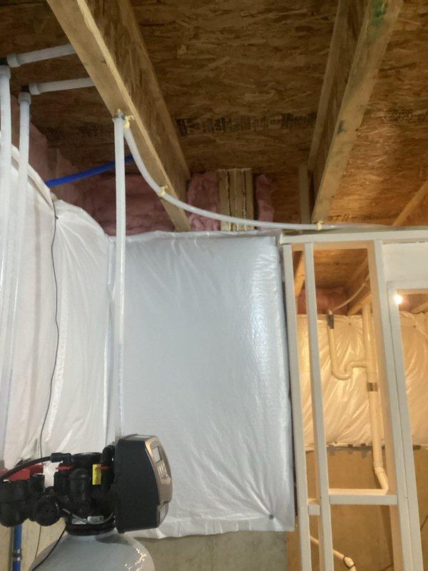 Returned to property to reroute water softener discharge line through attic space. Installed new PVC discharge piping with proper support brackets and secured routing along ceiling joists to appropriate termination point. Work completed as quoted.