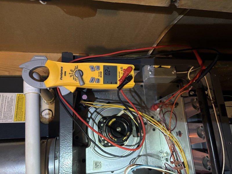 Completed annual heating maintenance on 2018 EnergiAir furnace system without humidifier, currently under warranty through June 2028. Performed comprehensive tune-up including electrical diagnostics using clamp meter to verify proper amperage draw on blower motor, inspected all wire connections and terminals for integrity, examined blower assembly and motor operation, and verified proper system function. All components found operating within normal parameters with no issues identified during inspection.