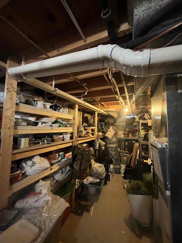 Completed annual heating maintenance on 13-year-old furnace and humidifier system in basement utility area. Performed comprehensive tune-up including inspection of heat exchanger, burner assembly, and combustion analysis; verified proper operation of all safety controls and limit switches; cleaned and adjusted burner components; checked and lubricated blower motor; replaced air filter; inspected and flushed humidifier system; tested thermostat operation and system cycling; verified proper venting through PVC exhaust system; confirmed all electrical connections secure; documented equipment condition with photos showing furnace, air handler, and associated ductwork in good operating condition with no immediate concerns noted.