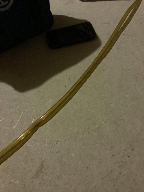 Responded to no heat call following previous day's tune-up. Upon inspection, discovered condensate drain system was clogged, preventing furnace operation due to safety switch activation. Cleared blockage from PVC condensate trap and drain lines, removed rust-colored buildup, verified proper drainage flow, and tested system to confirm furnace resumed normal heating operation to thermostat setpoint.