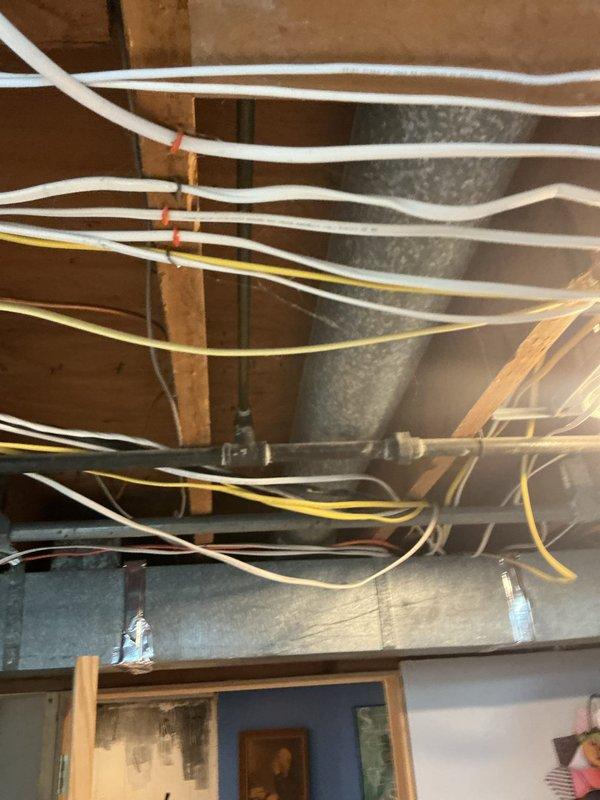 Responded to gas odor complaint following recent appliance connector installation. Conducted thorough inspection of gas lines, connections, and recently installed components in basement utility area. Performed leak detection testing using combustible gas indicator on all accessible gas piping, joints, and the new appliance connector. No active gas leaks detected at time of inspection. Verified all connections were properly tightened and sealed. Inspected exposed infrastructure including HVAC ductwork and surrounding areas for any potential safety concerns. Confirmed system integrity and safe operation of all gas appliances.